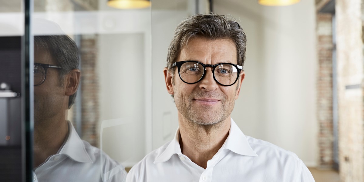 professional man with glasses, in the office